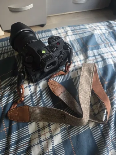 Cotton and leather camera strap photographed by a verified buyer