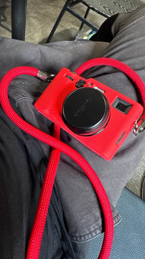 Braided rope camera strap photographed by a verified buyer