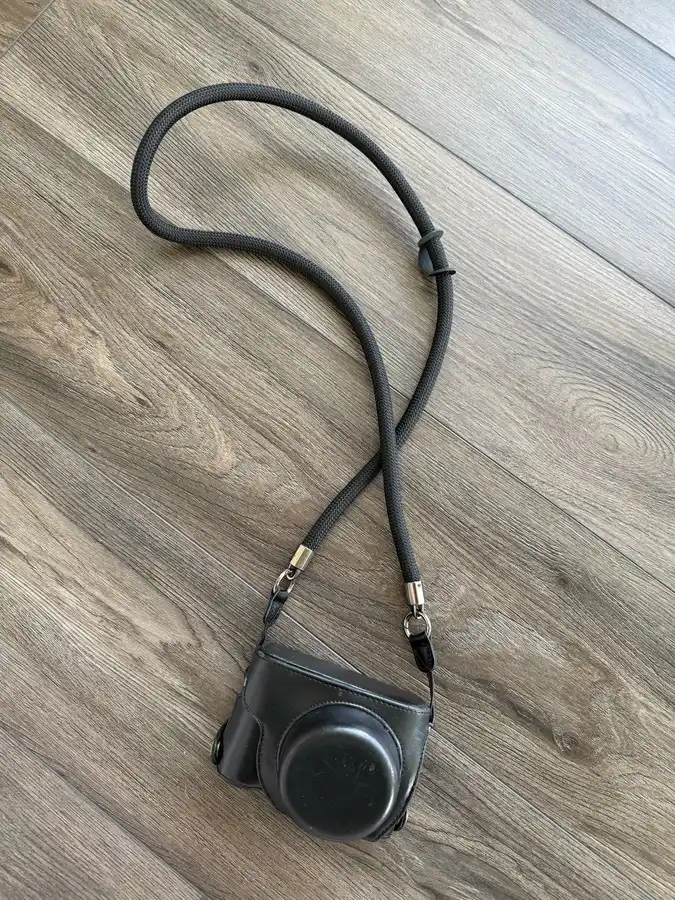Braided rope camera strap photographed by a verified buyer